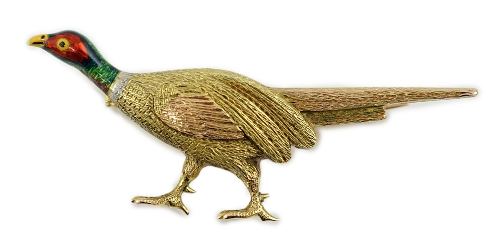 A George V three colour gold and enamelled pheasant brooch